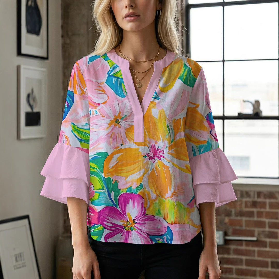 Damblus med voluminösa prickiga ärmar och blommönster Mirla-Eva Jonsson