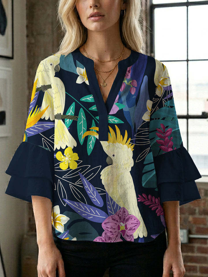 Damblus med voluminösa ryschkarmar och blommigt tryck Mirla-Eva Jonsson