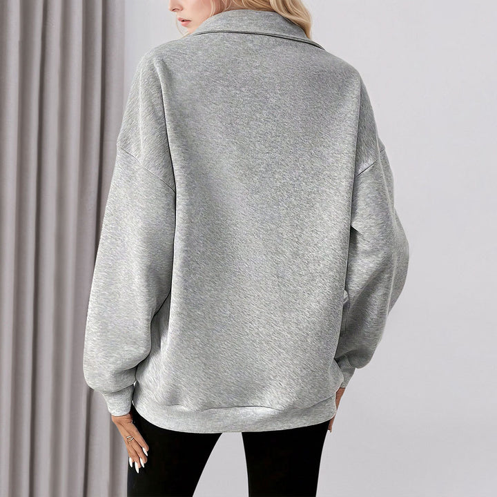 Damcasual sweatshirt med halv dragkedja och praktiska fickor Mirla-Eva Jonsson