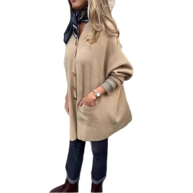 Damd cardigan med praktiska fickor och elegant knappdetalj Mirla-Eva Jonsson