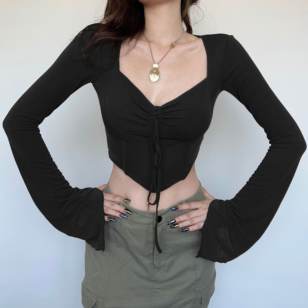 Damd cropped topp med volanger och utsvängda ärmar Mirla-Eva Jonsson