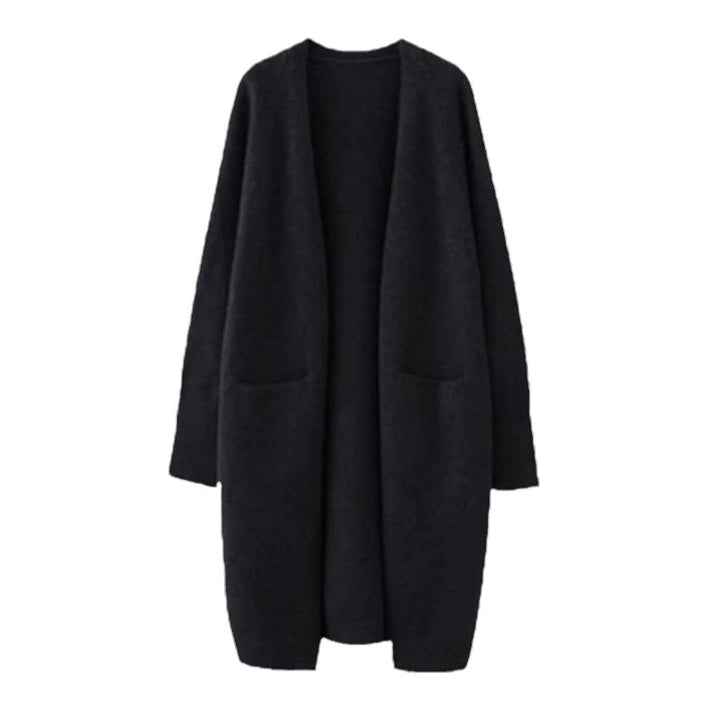 Damd oversized stickad kappa med fickor och avslappnad passform Mirla-Eva Jonsson
