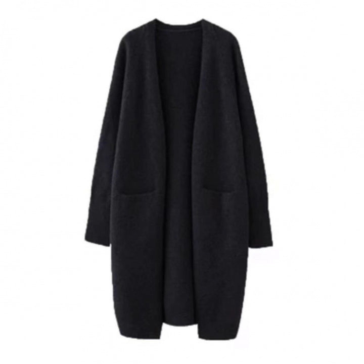 Damd oversized stickad kappa med fickor och avslappnad passform Mirla-Eva Jonsson