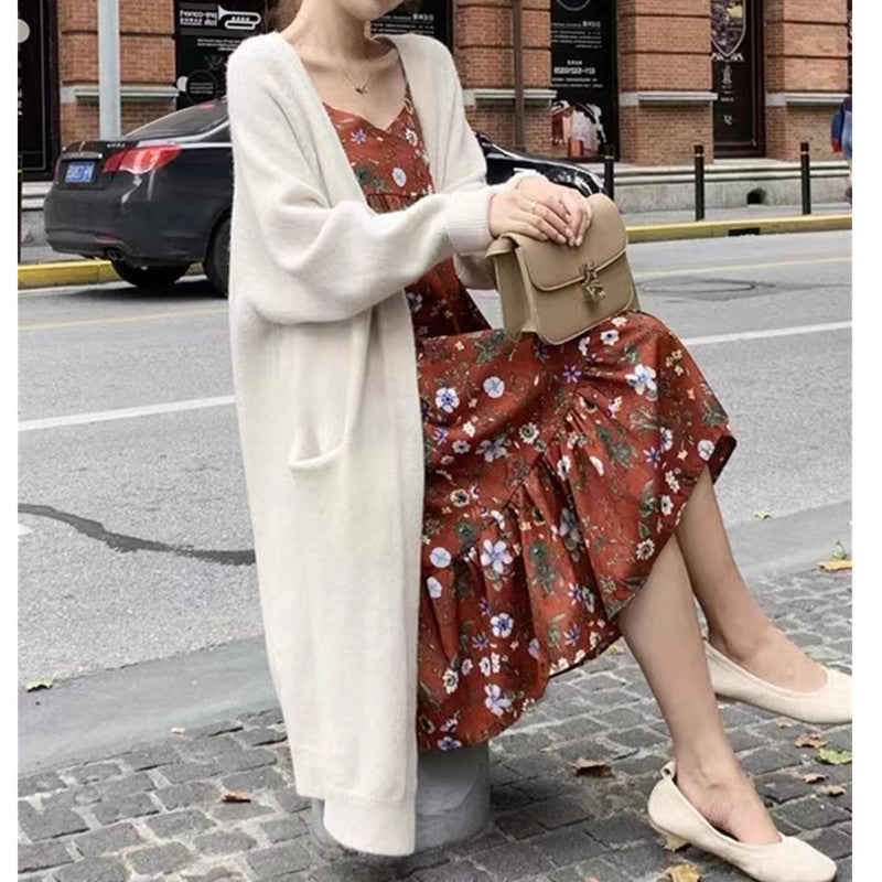 Damd oversized stickad kappa med fickor och avslappnad passform Mirla-Eva Jonsson