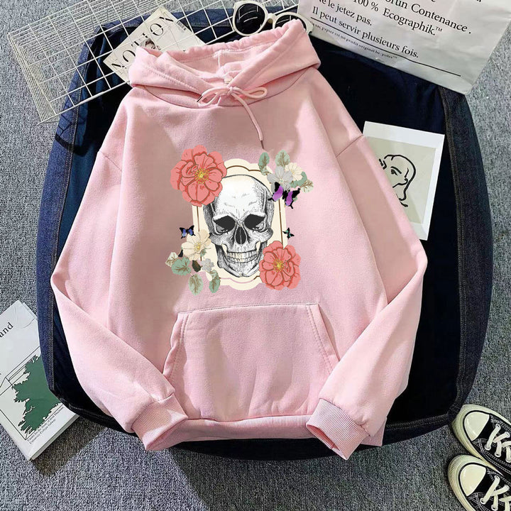 Damdammare med kreativt skalle- och blommönster Mirla-Eva Jonsson