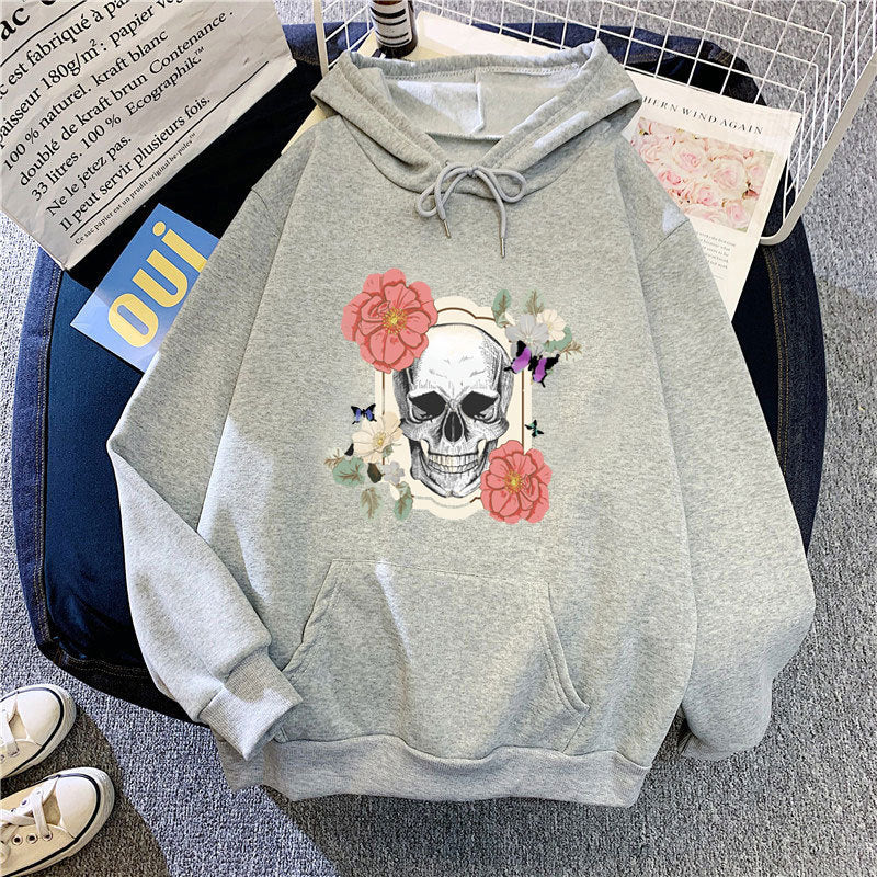 Damdammare med kreativt skalle- och blommönster Mirla-Eva Jonsson