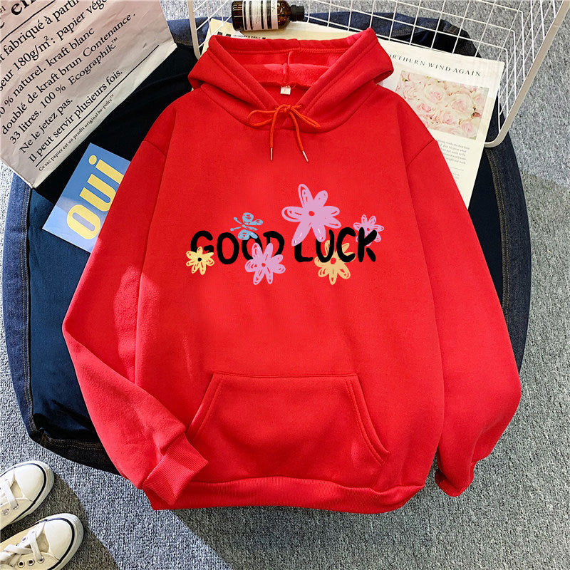 Damdress med glatt mönster och tryckt text Mirla-Eva Jonsson