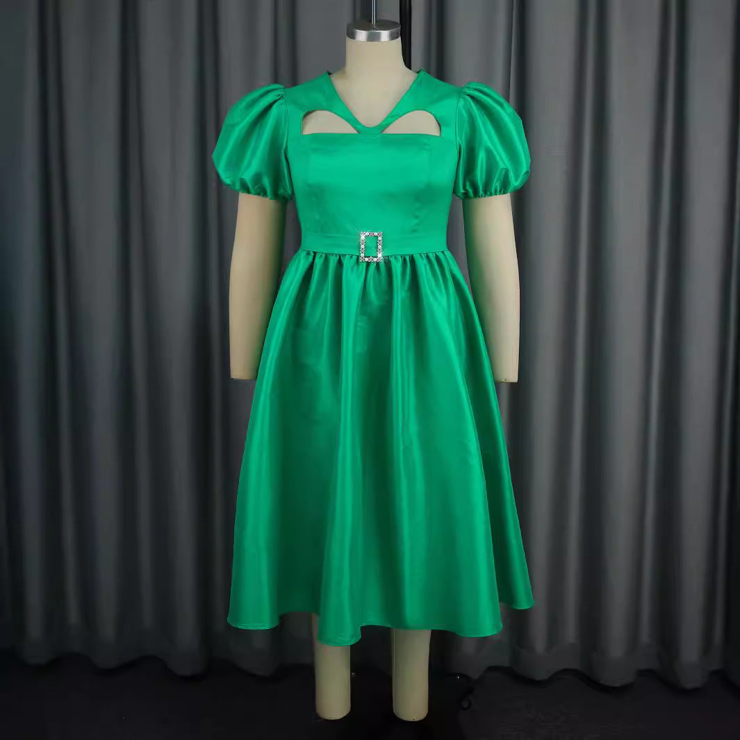 Dame Aftenkjol med modiga puffärmar och unik cut-out-design Mirla-Eva Jonsson