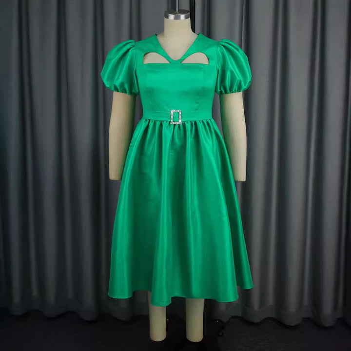 Dame Aftenkjol med modiga puffärmar och unik cut-out-design Mirla-Eva Jonsson