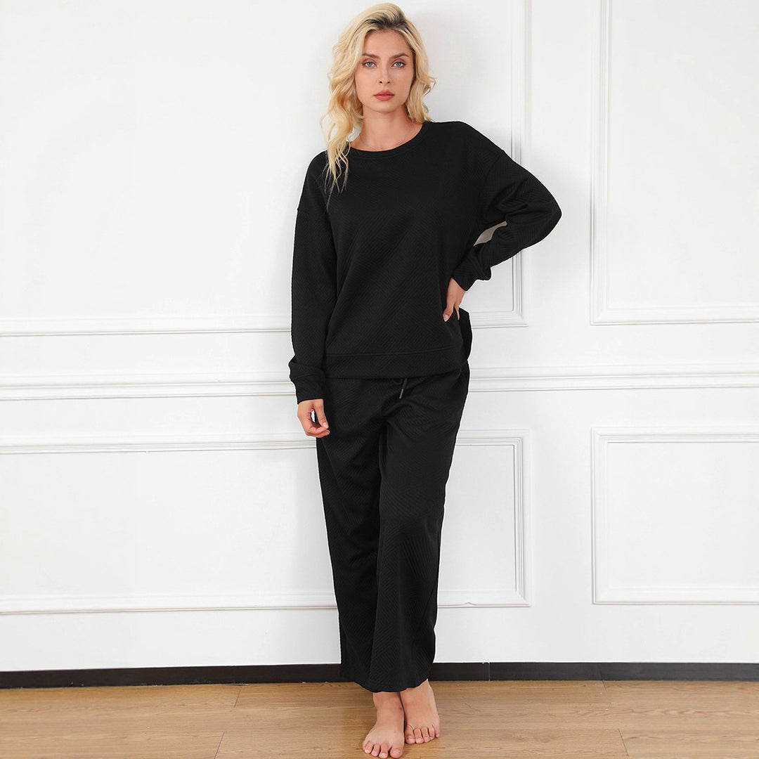 Dame Bekväm Lounge-set med elegant knytband och vid byxfot Mirla-Eva Jonsson