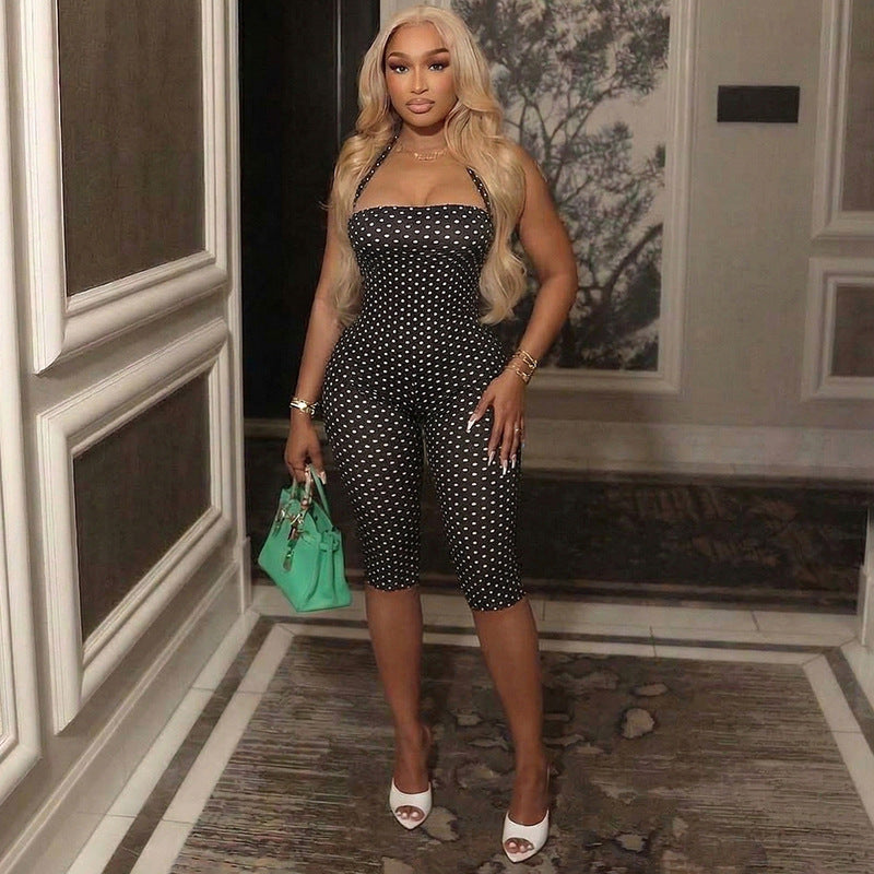 Dame Bodycon jumpsuit med prickmönster och off-shoulder design Mirla-Eva Jonsson