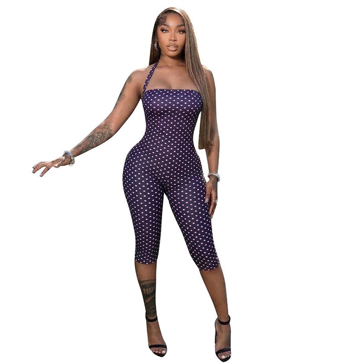 Dame Bodycon jumpsuit med prickmönster och off-shoulder design Mirla-Eva Jonsson