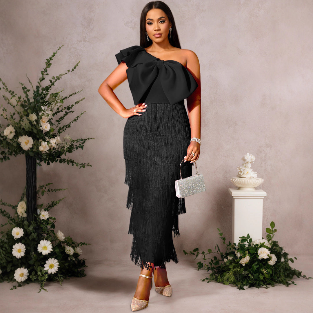 Dame Cocktailklänning med voluminös ruffle-design och fransar Mirla-Eva Jonsson