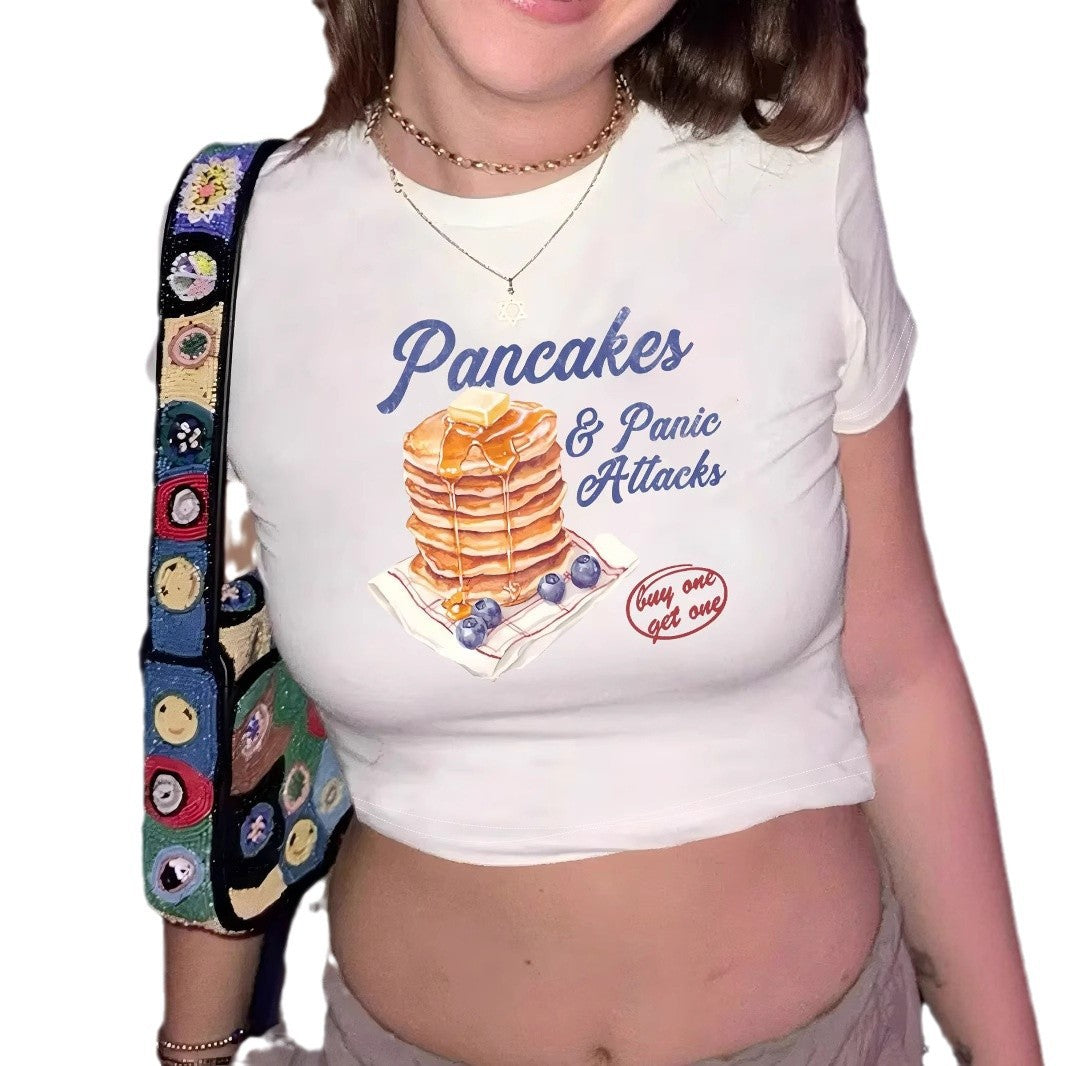 Dame Crop-T-Shirt med humoristisk pannkakedesign Mirla-Eva Jonsson