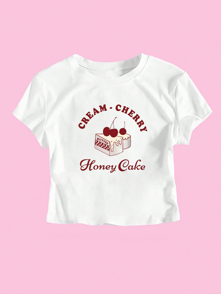 Dame Crop-T-Shirt med kreativ dessertmotiv och modern skärning Mirla-Eva Jonsson