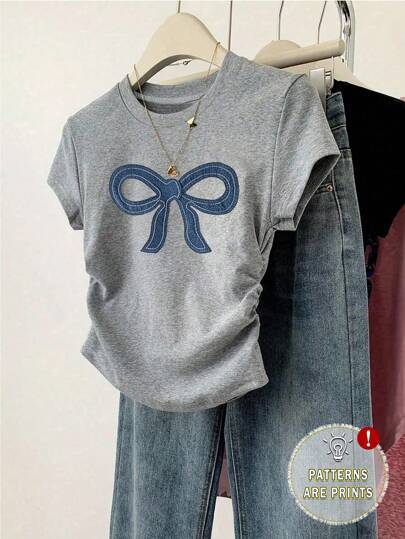 Dame Crop-T-shirt med figurnära skärning og moderne design Mirla-Eva Jonsson