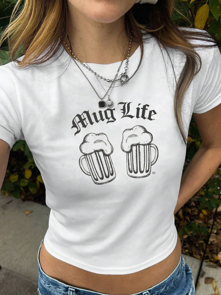 Dame Crop-T-shirt med kreativ läppmotiv och figursydd passform Mirla-Eva Jonsson