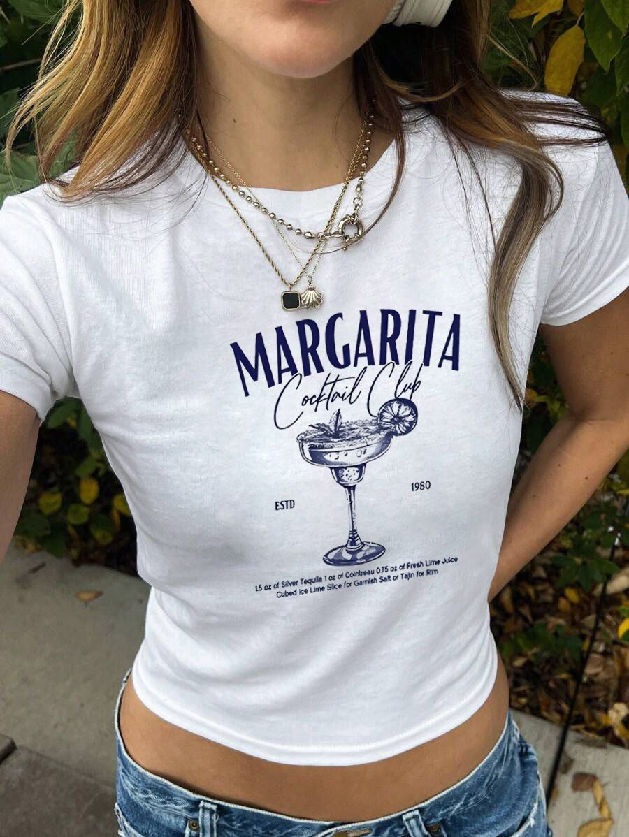 Dame Crop-T-shirt med kreativ nostalgi-tryck och avslappnad skärning Mirla-Eva Jonsson
