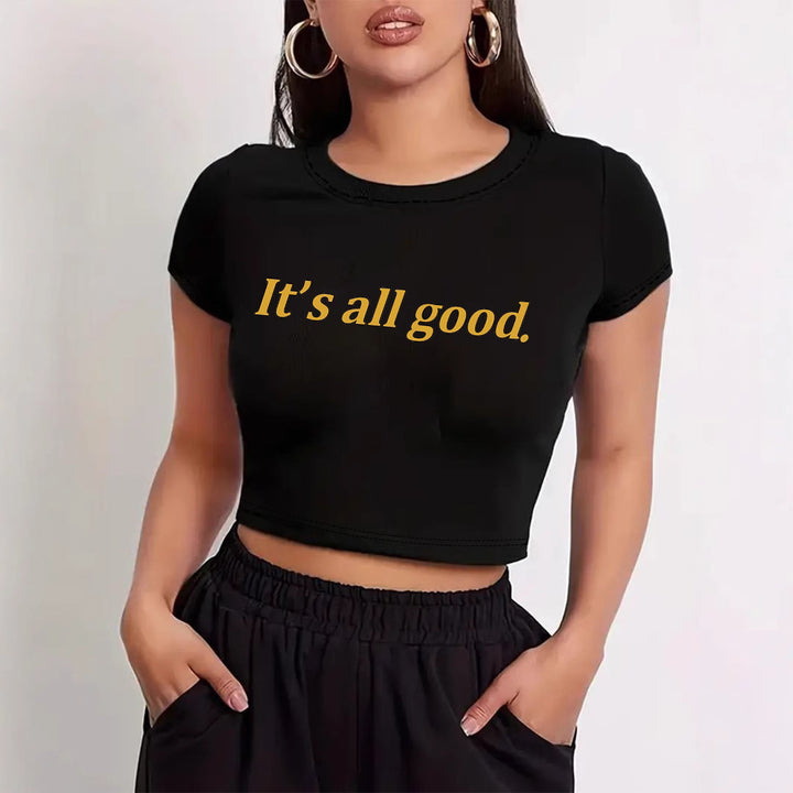 Dame Crop-T-shirt med lekfullt körsbärsmotiv och elegant rosetttryck Mirla-Eva Jonsson