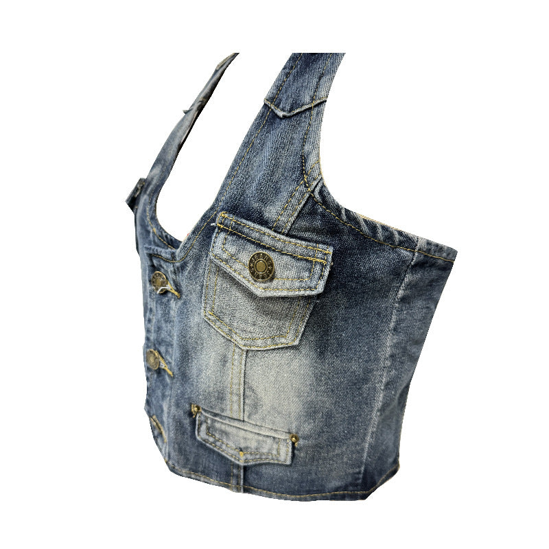 Dame Crop-Top av denim med dekorativa knappdetaljer och djup V-ringning Mirla-Eva Jonsson