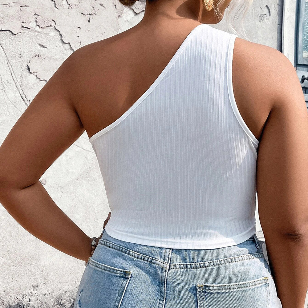 Dame Crop-Top med asymmetrisk skärning och cut-out-detaljer Mirla-Eva Jonsson