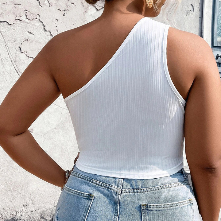 Dame Crop-Top med asymmetrisk skärning och cut-out-detaljer Mirla-Eva Jonsson