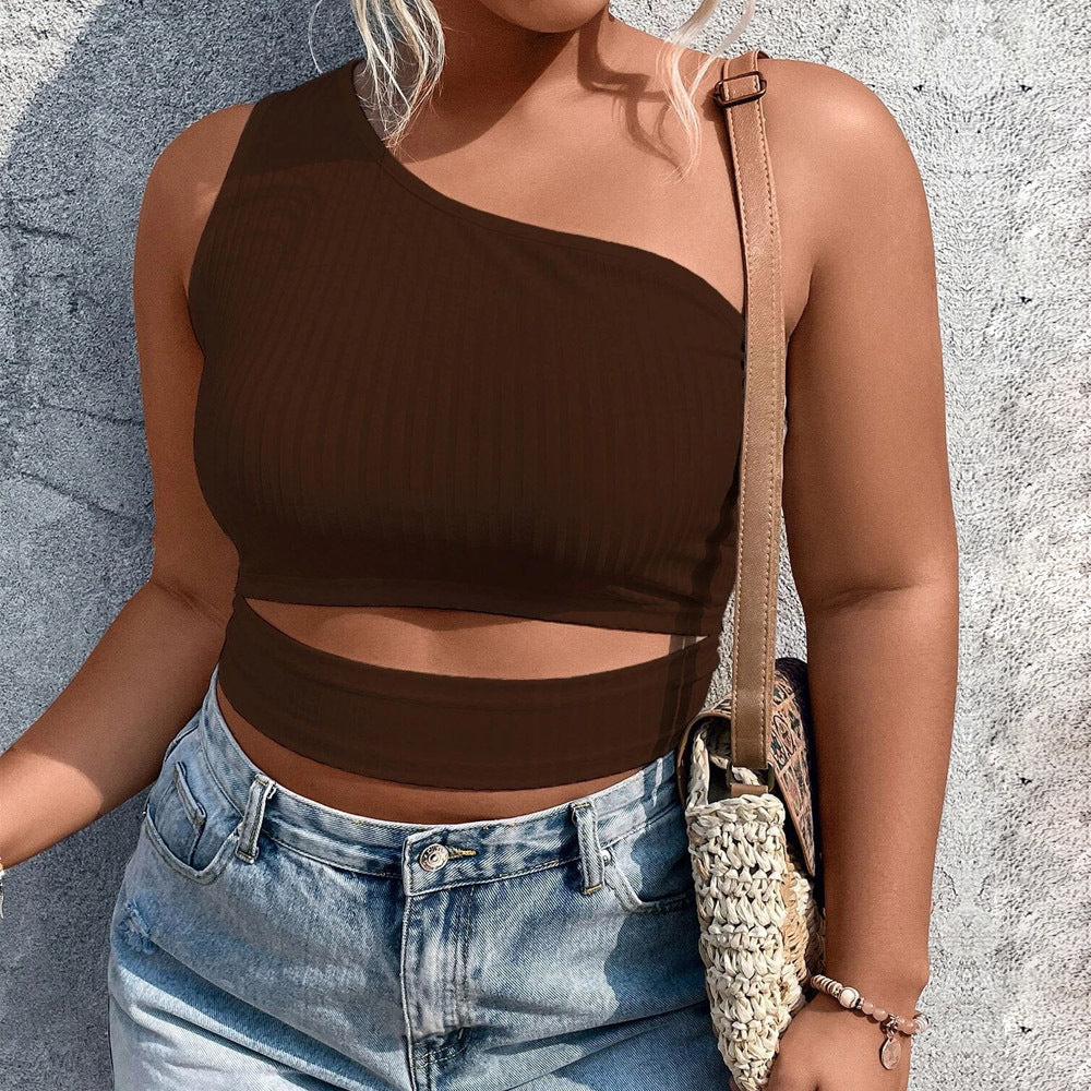 Dame Crop-Top med asymmetrisk skärning och cut-out-detaljer Mirla-Eva Jonsson