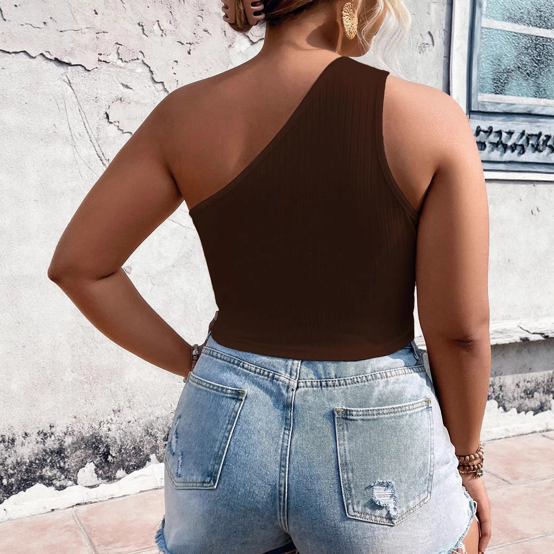 Dame Crop-Top med asymmetrisk skärning och cut-out-detaljer Mirla-Eva Jonsson