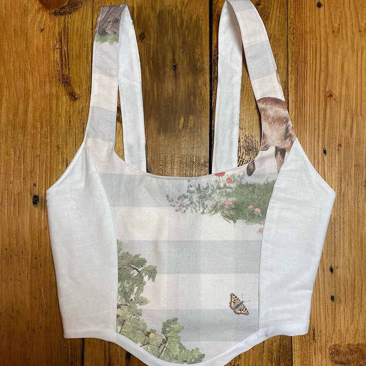 Dame Crop Top med konstnärlig flora-design och justerbara axelband Mirla-Eva Jonsson