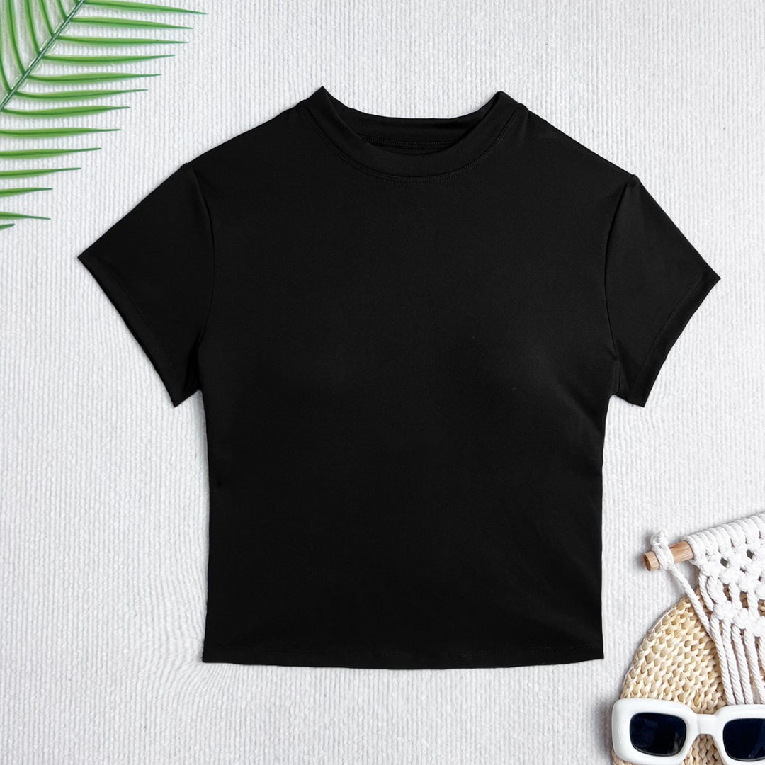 Dame Crop-Top med kreativ baksidedesign och figurnära passform Mirla-Eva Jonsson