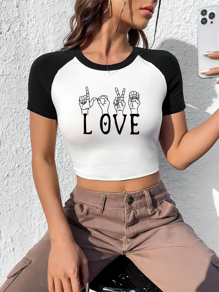 Dame Crop-Top med motiverande text och avslappnad passform Mirla-Eva Jonsson