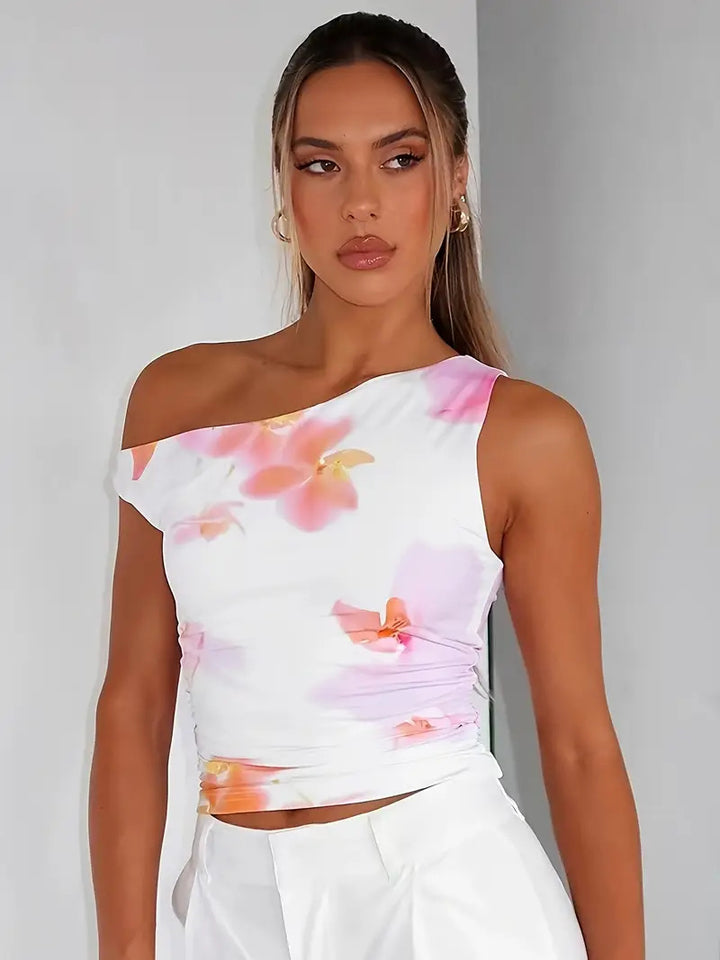Dame Crop-top med blommigt mönster och off-shoulder design Mirla-Eva Jonsson