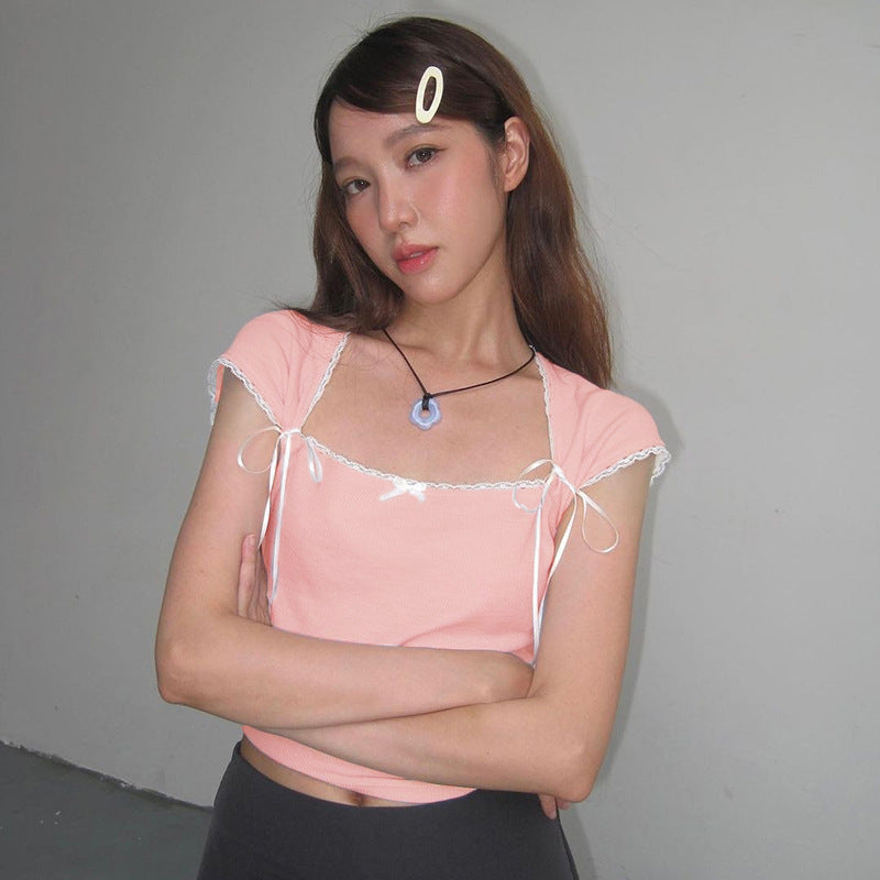 Dame Crop-top med justerbara spagettiband och eleganta knutdetaljer Mirla-Eva Jonsson