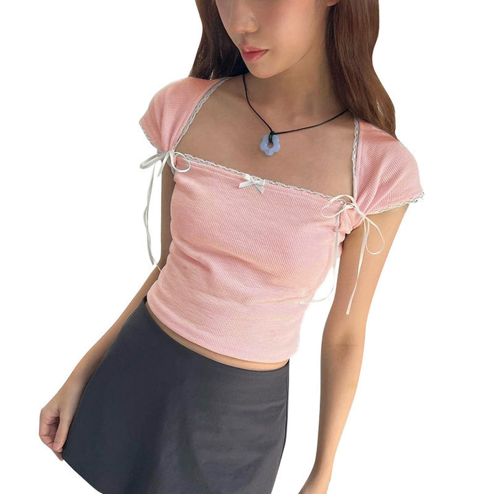 Dame Crop-top med justerbara spagettiband och eleganta knutdetaljer Mirla-Eva Jonsson