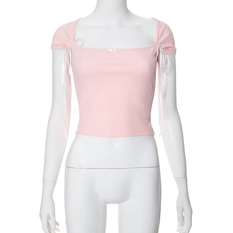 Dame Crop-top med justerbara spagettiband och eleganta knutdetaljer Mirla-Eva Jonsson