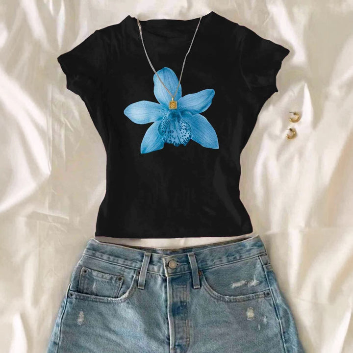 Dame Cropped T-Shirt med blommönster och avslappnad passform Mirla-Eva Jonsson