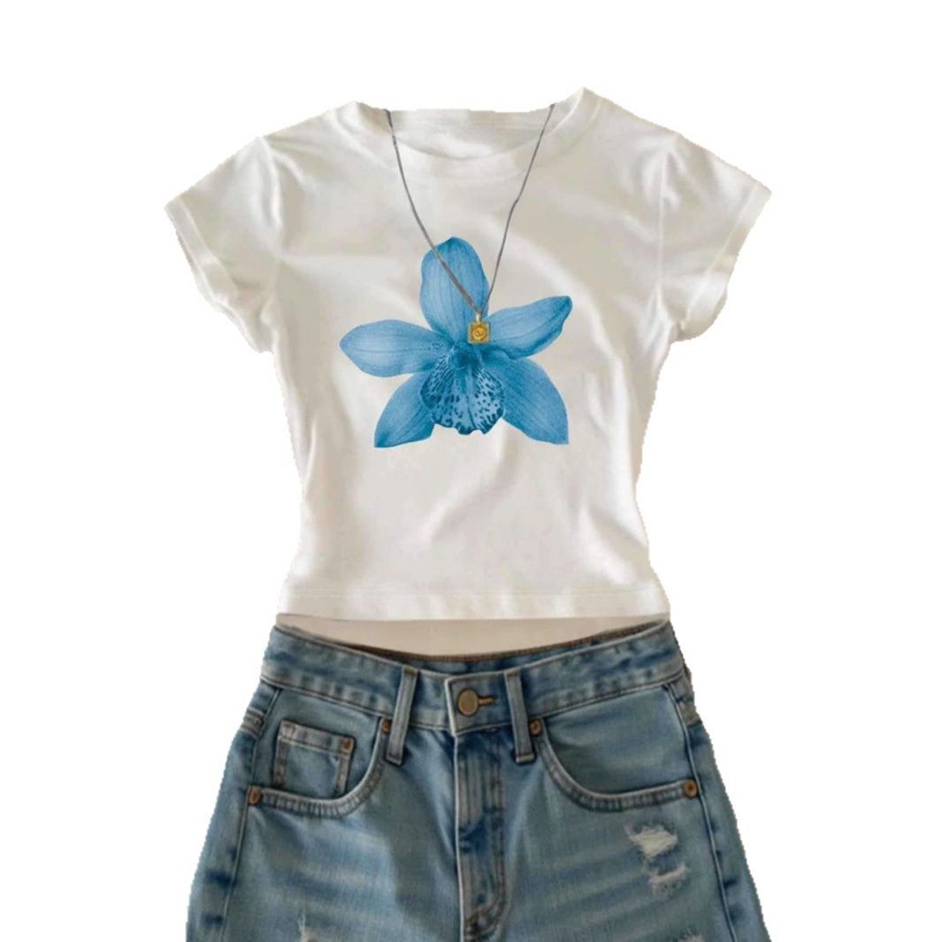 Dame Cropped T-Shirt med blommönster och avslappnad passform Mirla-Eva Jonsson