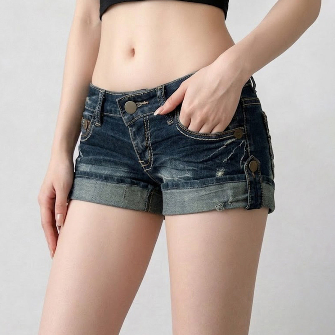 Dame Denim Shorts med modiga knappdetaljer och avslappnad design Mirla-Eva Jonsson