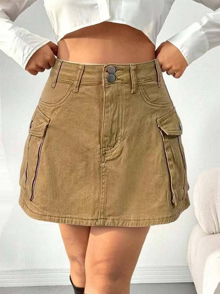Dame Denim-minikjol med påsydda fickor och moderna detaljer Mirla-Eva Jonsson