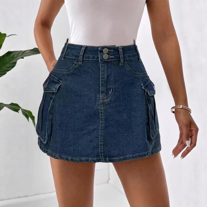 Dame Denim-minikjol med påsydda fickor och moderna detaljer Mirla-Eva Jonsson