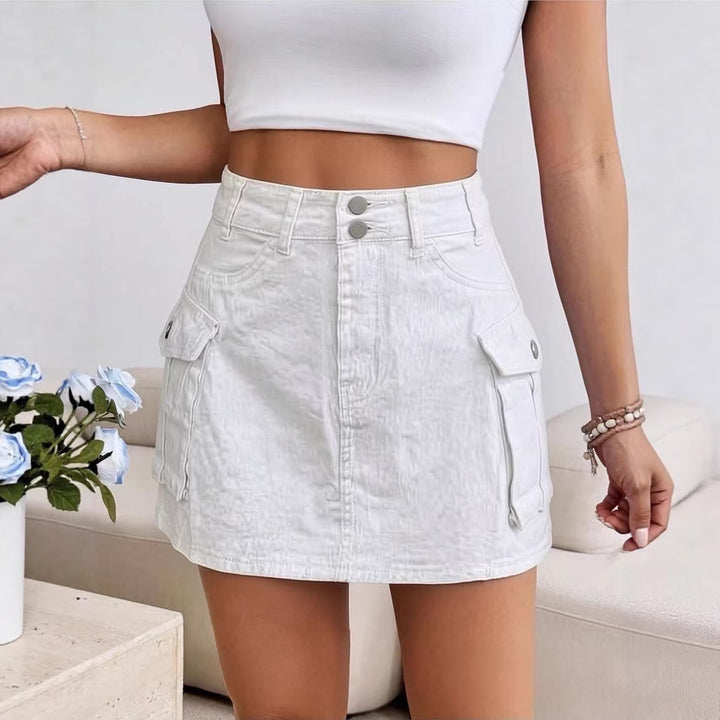 Dame Denim-minikjol med påsydda fickor och moderna detaljer Mirla-Eva Jonsson