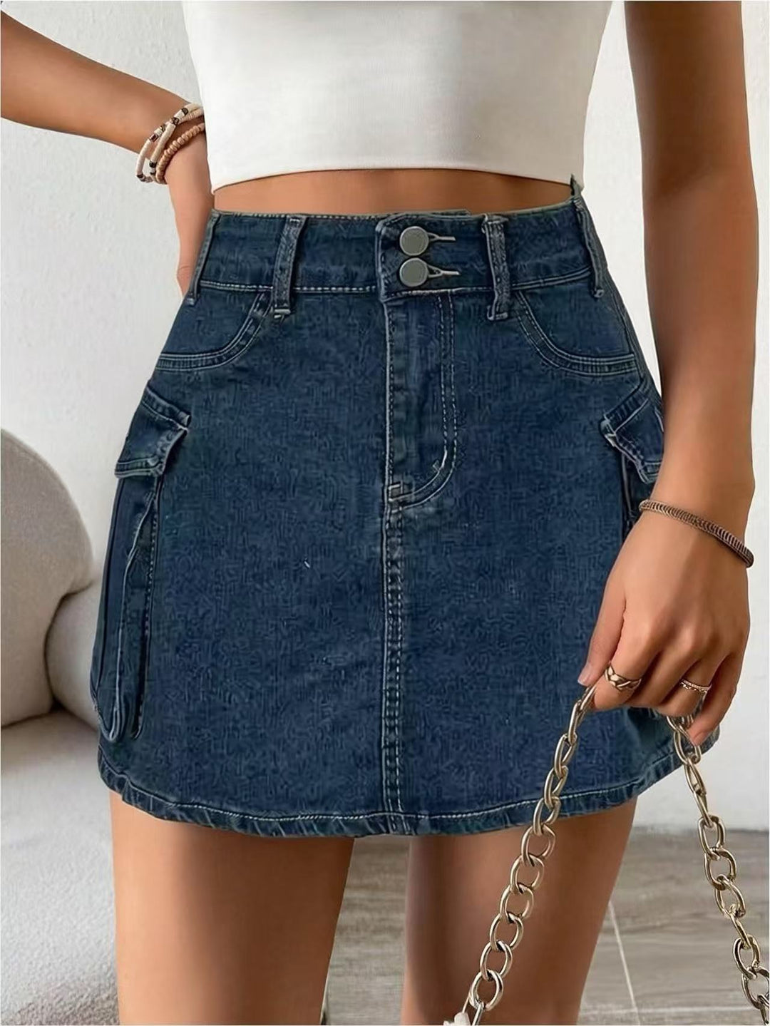 Dame Denim-minikjol med påsydda fickor och moderna detaljer Mirla-Eva Jonsson