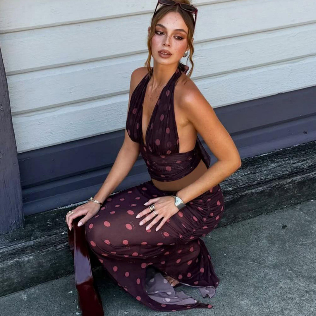 Dame Elegant Maxiklänning i polka-prickar design med djup V-ringning och figursydd silhuett Mirla-Eva Jonsson