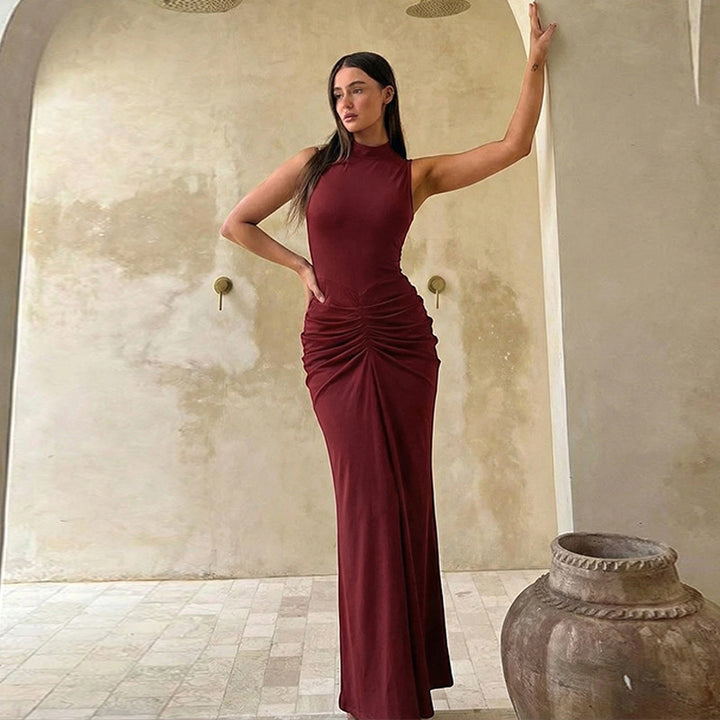 Dame Elegant Maxiklärning med asymmetrisk skärning och hög krage Design Mirla-Eva Jonsson