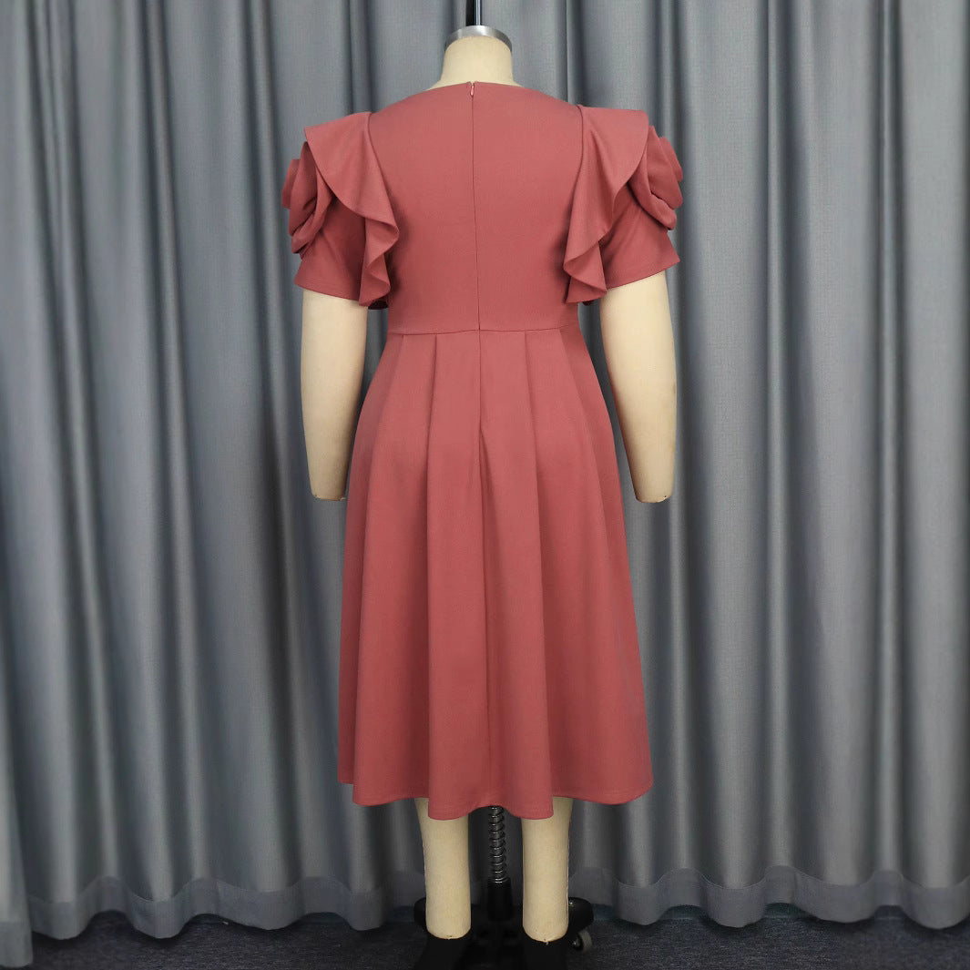 Dame Elegant Midi-klänning med voluminösa rynkade ärmar och glittrande prydnadsdetalj Mirla-Eva Jonsson