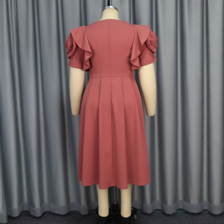 Dame Elegant Midi-klänning med voluminösa rynkade ärmar och glittrande prydnadsdetalj Mirla-Eva Jonsson
