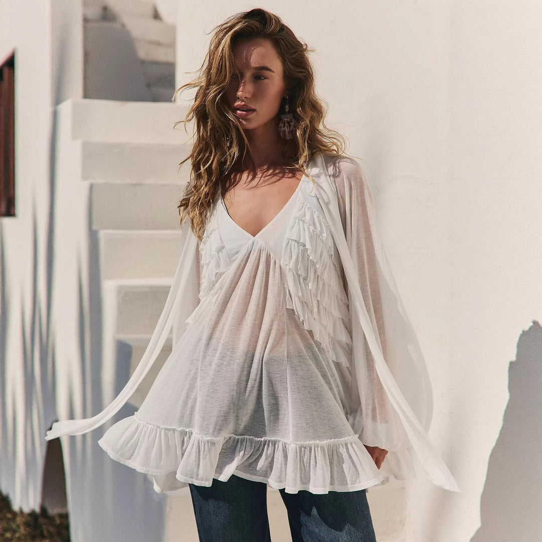 Dame Elegant Ruffle Blouse Dress with Deep V-Neck and Flowing Fabric Mirla-Eva Jonsson