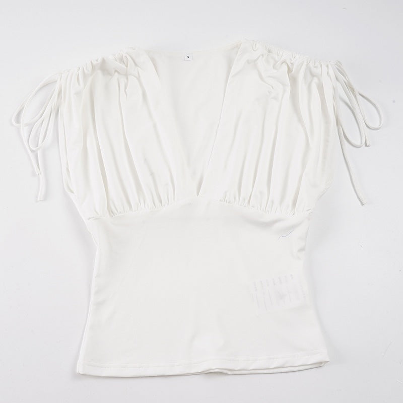 Dame Elegant Vingbluse med Volangdetaljer og Dyp V-Uringning Mirla-Eva Jonsson