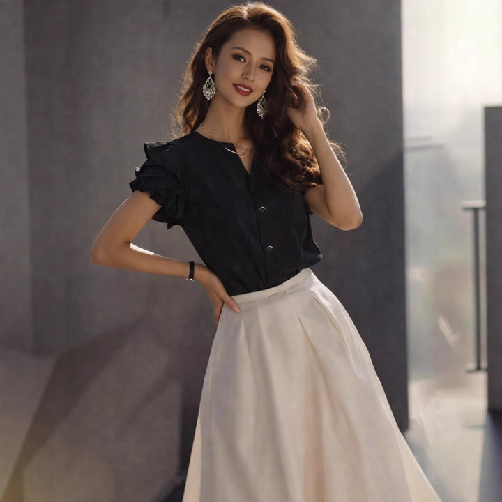 Dame Elegant blus med volangdetaljer i enkel design Mirla-Eva Jonsson