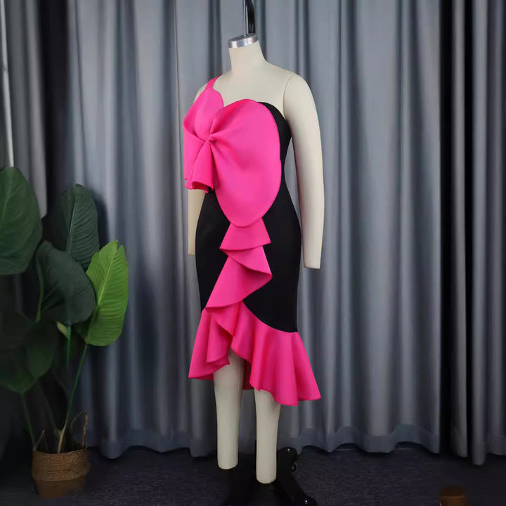 Dame Elegant cocktail dress with statement ruffle design and plus size Mirla-Eva Jonsson